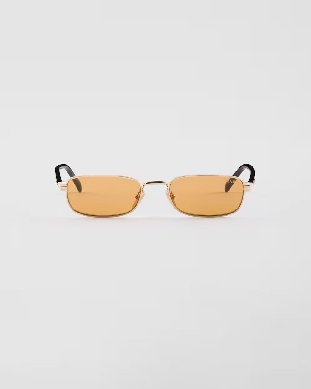 Sunglasses with the iconic metal plaque