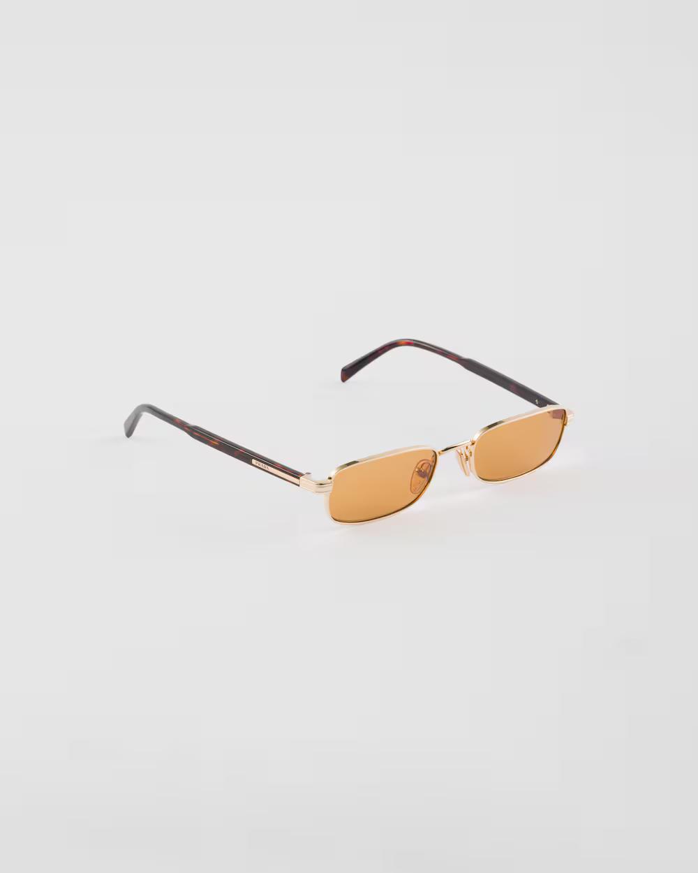 Sunglasses with the iconic metal plaque